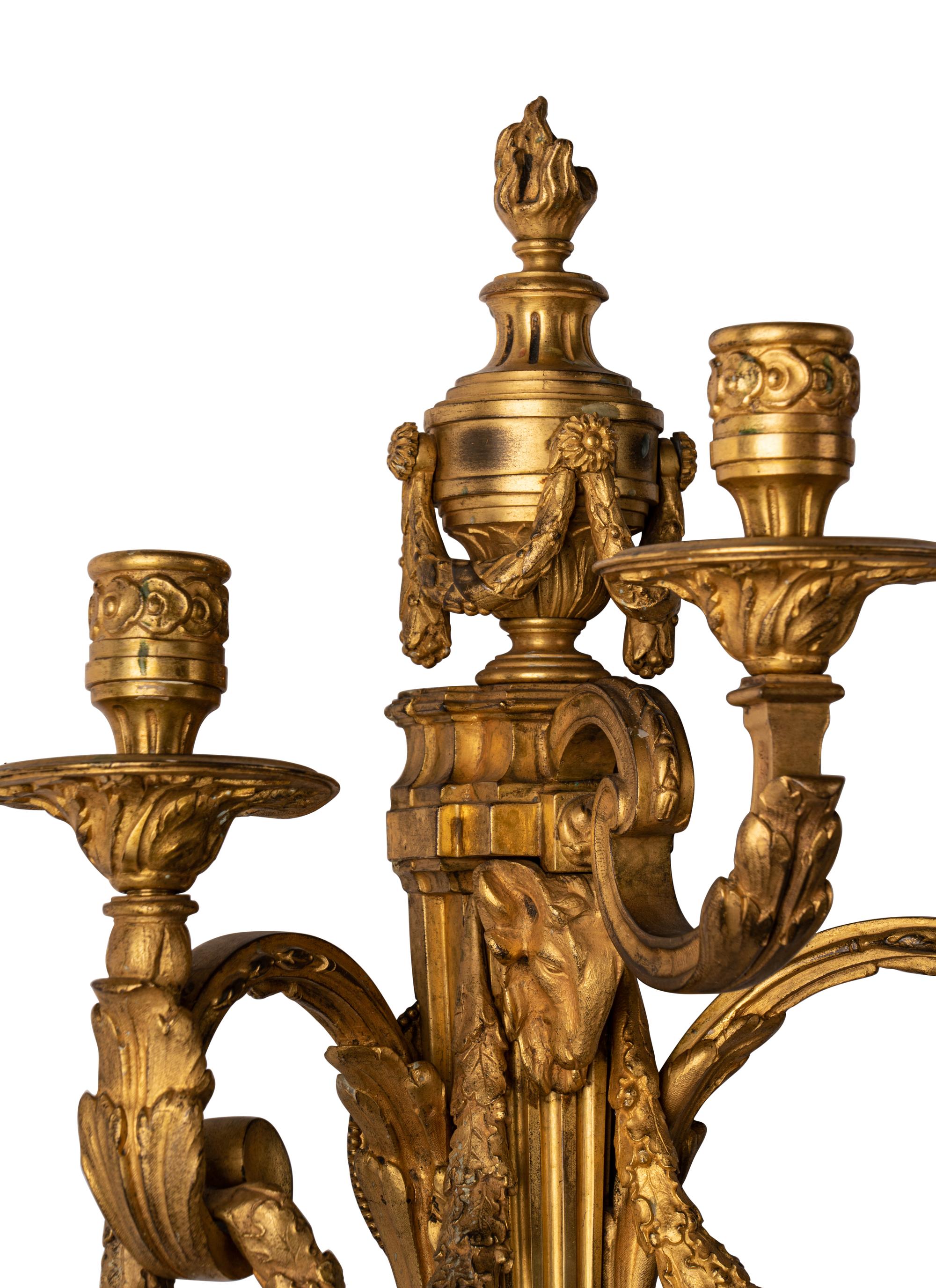 A Pair of Louis XVI Style Gilt Bronze Three-Light Sconces