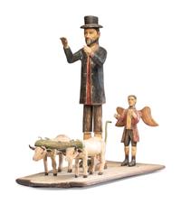 A Carved and Painted New Mexican Bulto of Saint Isidore