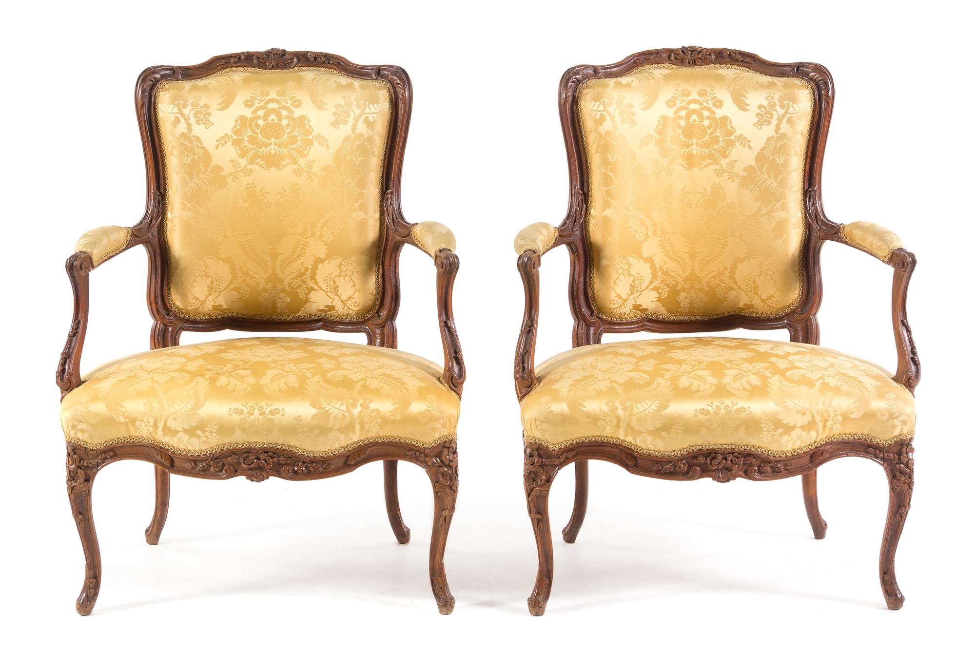A Pair of Louis XV Style Walnut Fauteuils Height 36 inches. — 18TH/19TH CENTURY