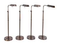 A Set of Four of Bronze-Tone Cantilevered Reading Lamps
