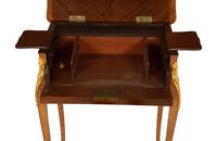 A Louis XV Style Gilt Metal Mounted Parquetry Dressing Table