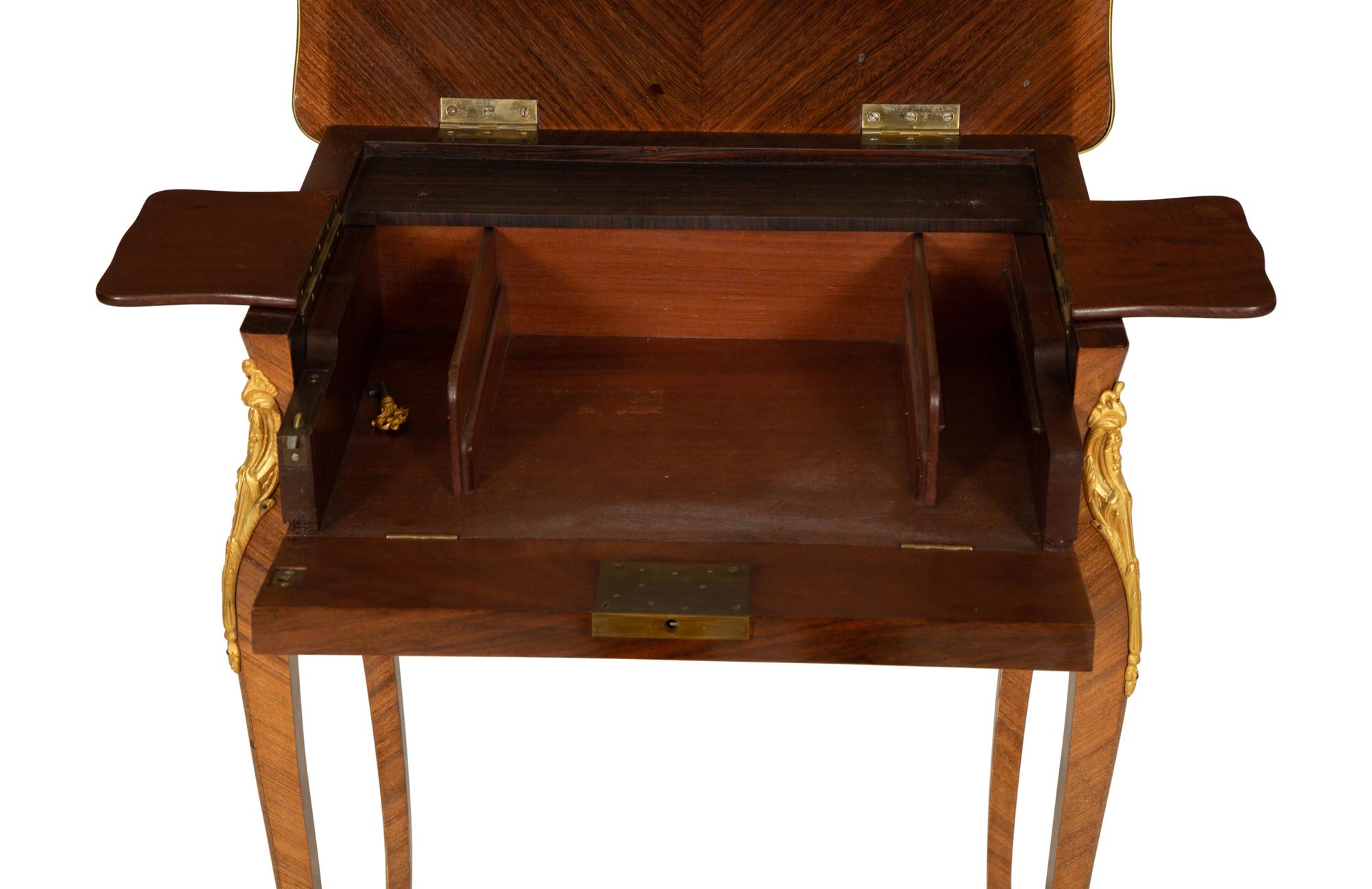 A Louis XV Style Gilt Metal Mounted Parquetry Dressing Table