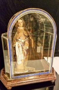 An Italian or Spanish Creche Figure. Height 22 1/2 x width 20 1/2 x depth 11 3/4 inches.
