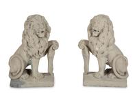 A Pair of Cast Stone Seated Lions