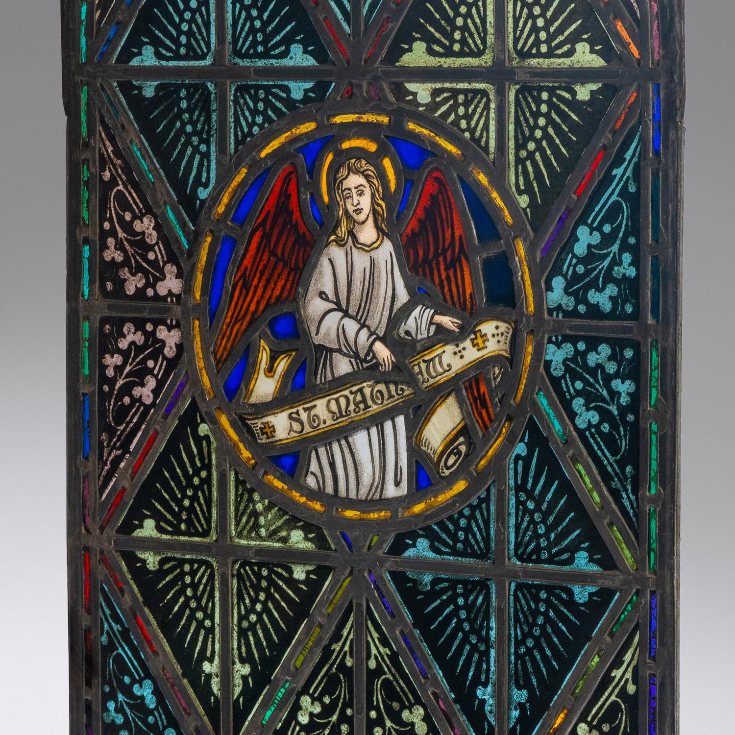 Window with Gothic-arch and painted St. Matthew