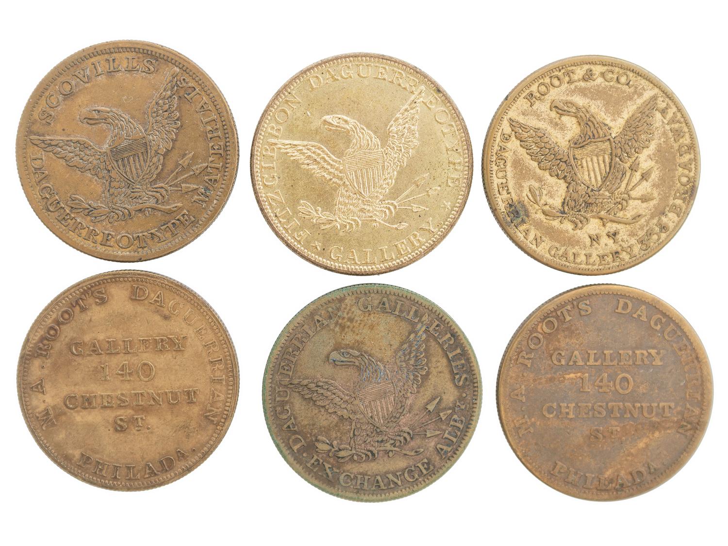 [EARLY PHOTOGRAPHY]. A group of daguerreian tokens incl. Meade Bros., Root & Co., Fitzgibbon, and others.
