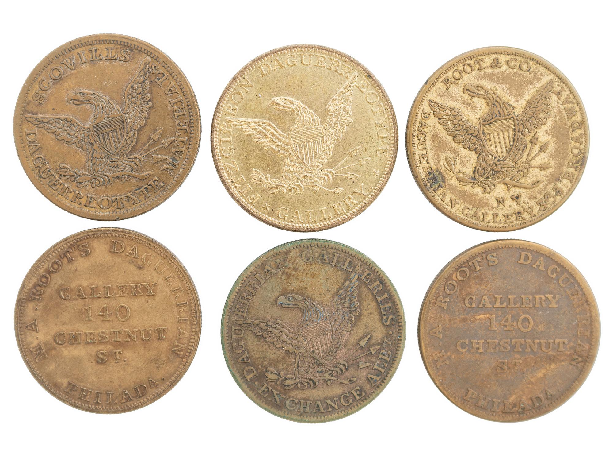 [EARLY PHOTOGRAPHY]. A group of daguerreian tokens incl. Meade Bros., Root & Co., Fitzgibbon, and others.