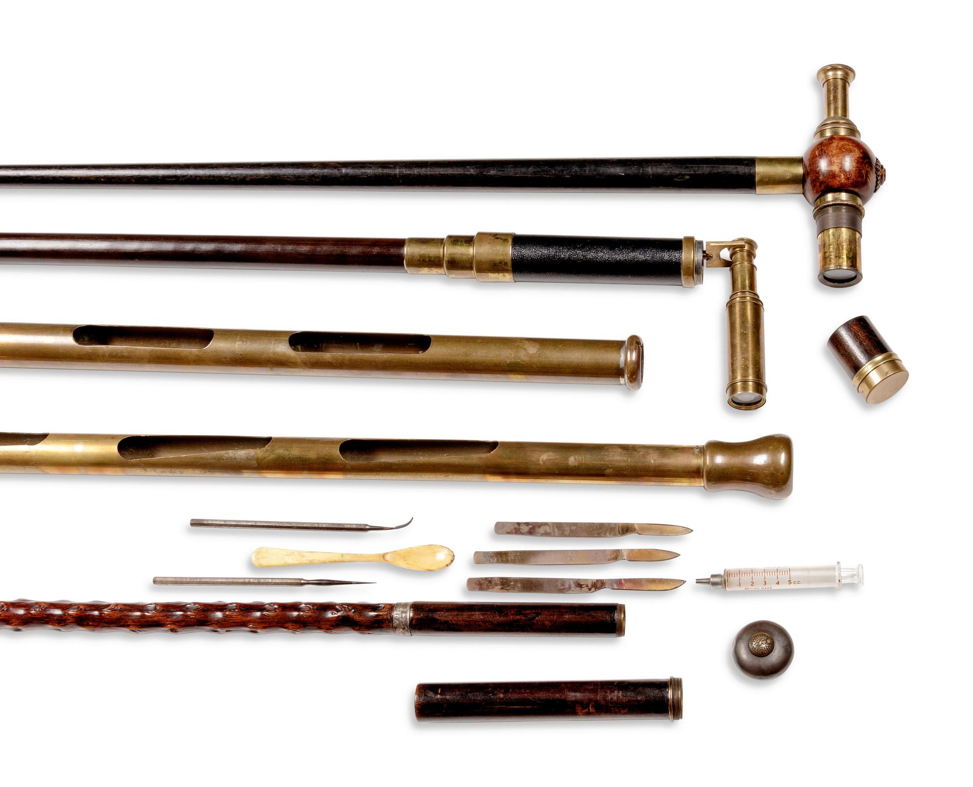 Four English Brass Mounted Explorer's Walking Sticks