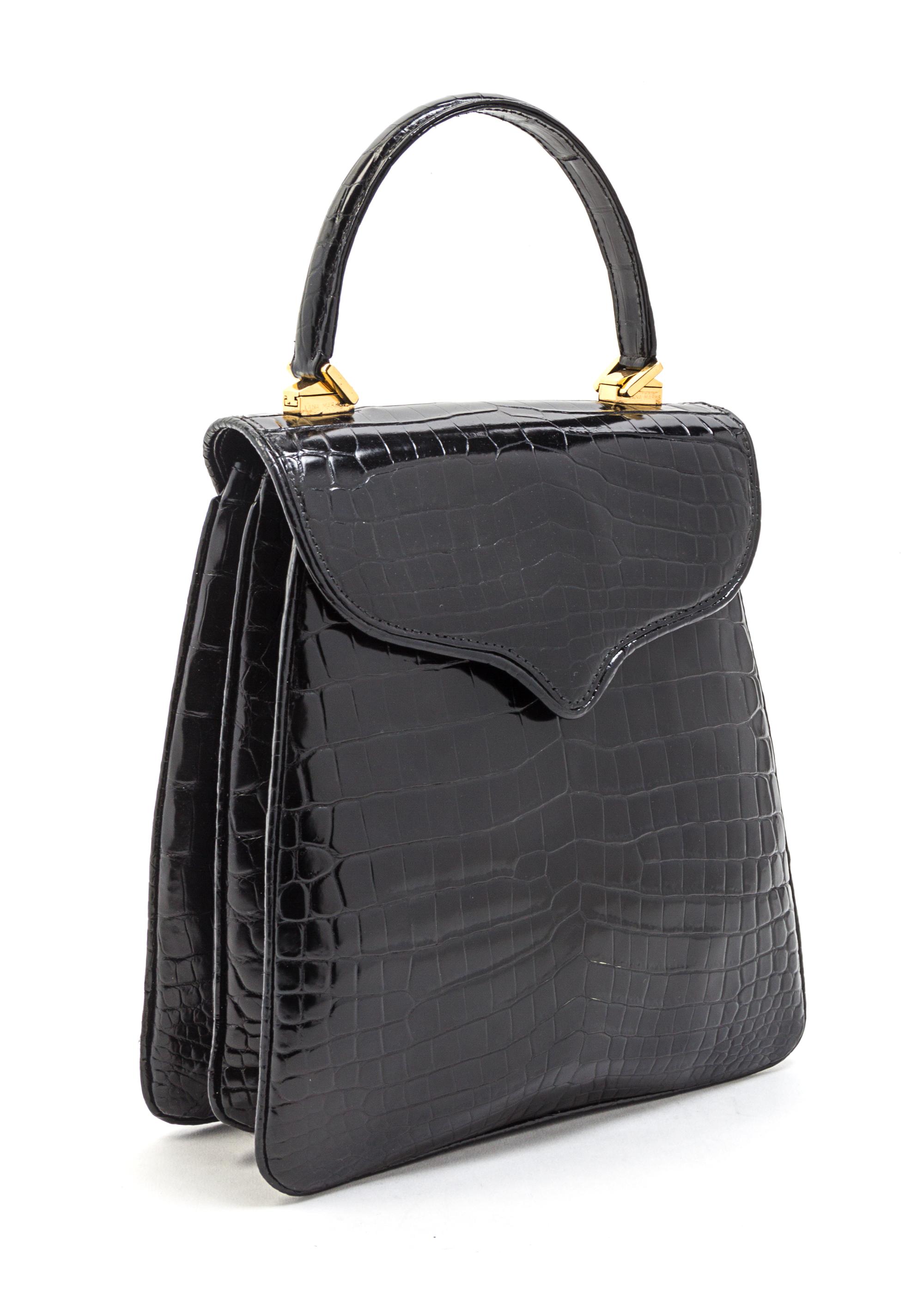 A Lana Marks Black Alligator Bag, 9 x 8 1/2 x 3 inches.