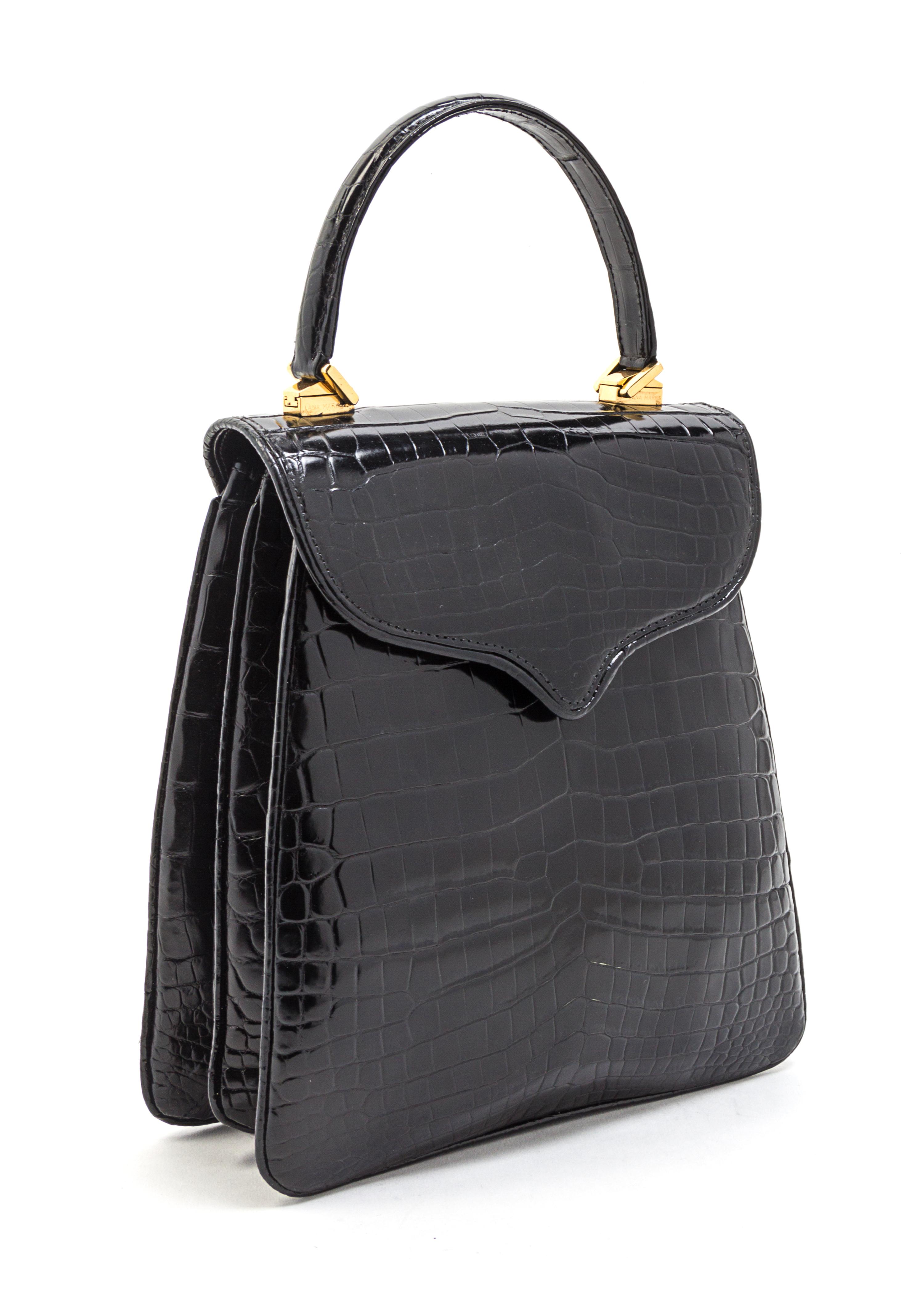 A Lana Marks Black Alligator Bag, 9 x 8 1/2 x 3 inches.