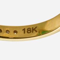 An 18K Yellow Gold, Emerald, and Diamond Ring