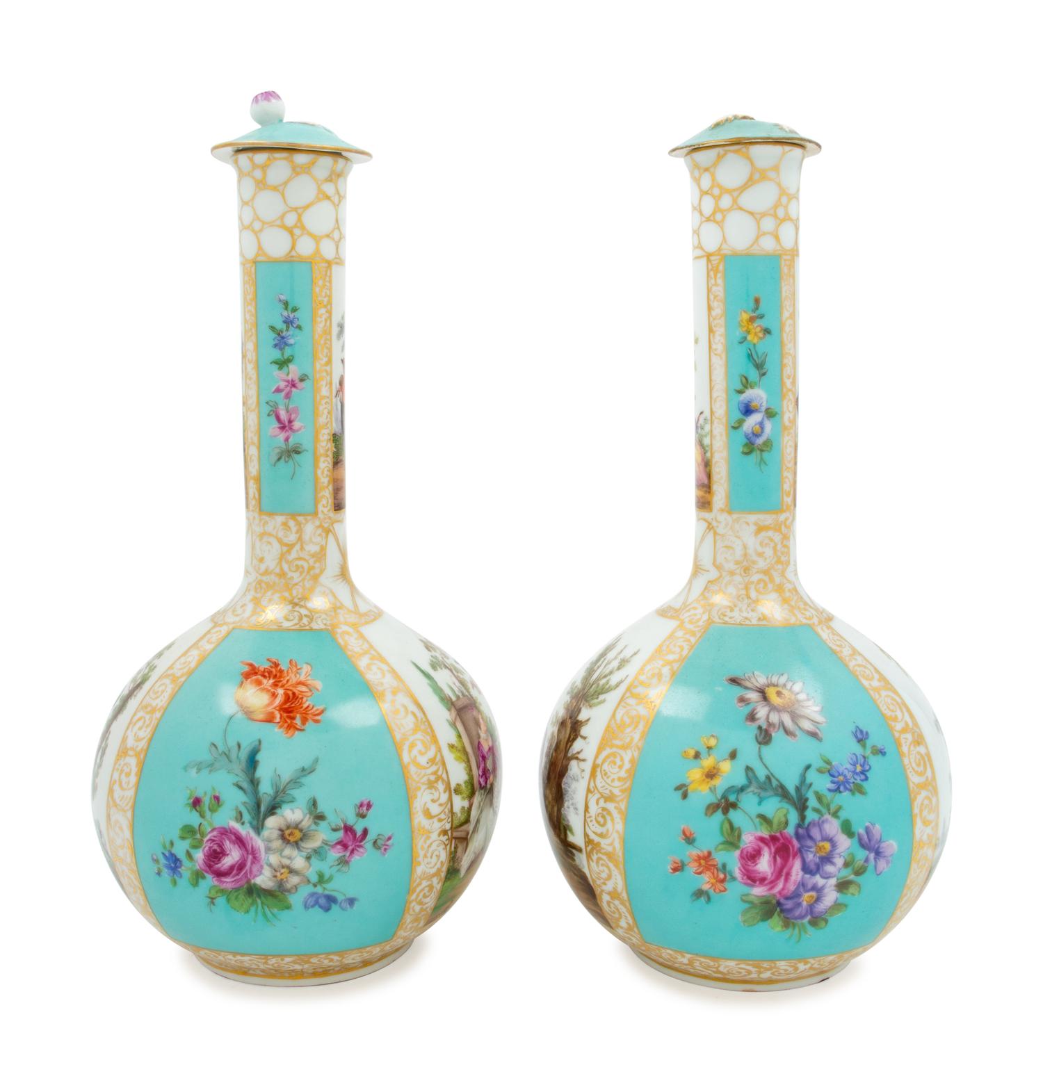 A Pair of German Porcelain Covered Vases
