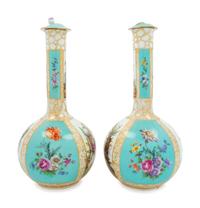 A Pair of German Porcelain Covered Vases