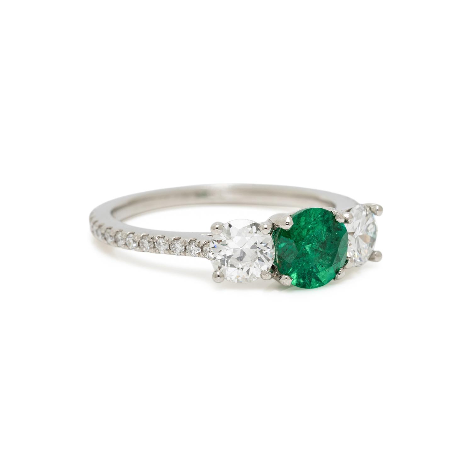 EMERALD, DIAMOND, AND PLATINUM RING