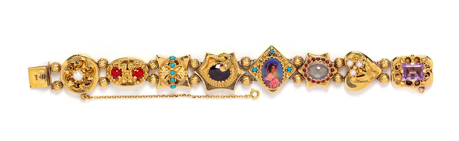 A 14 Karat Yellow Gold and Multigem Slide Bracelet,