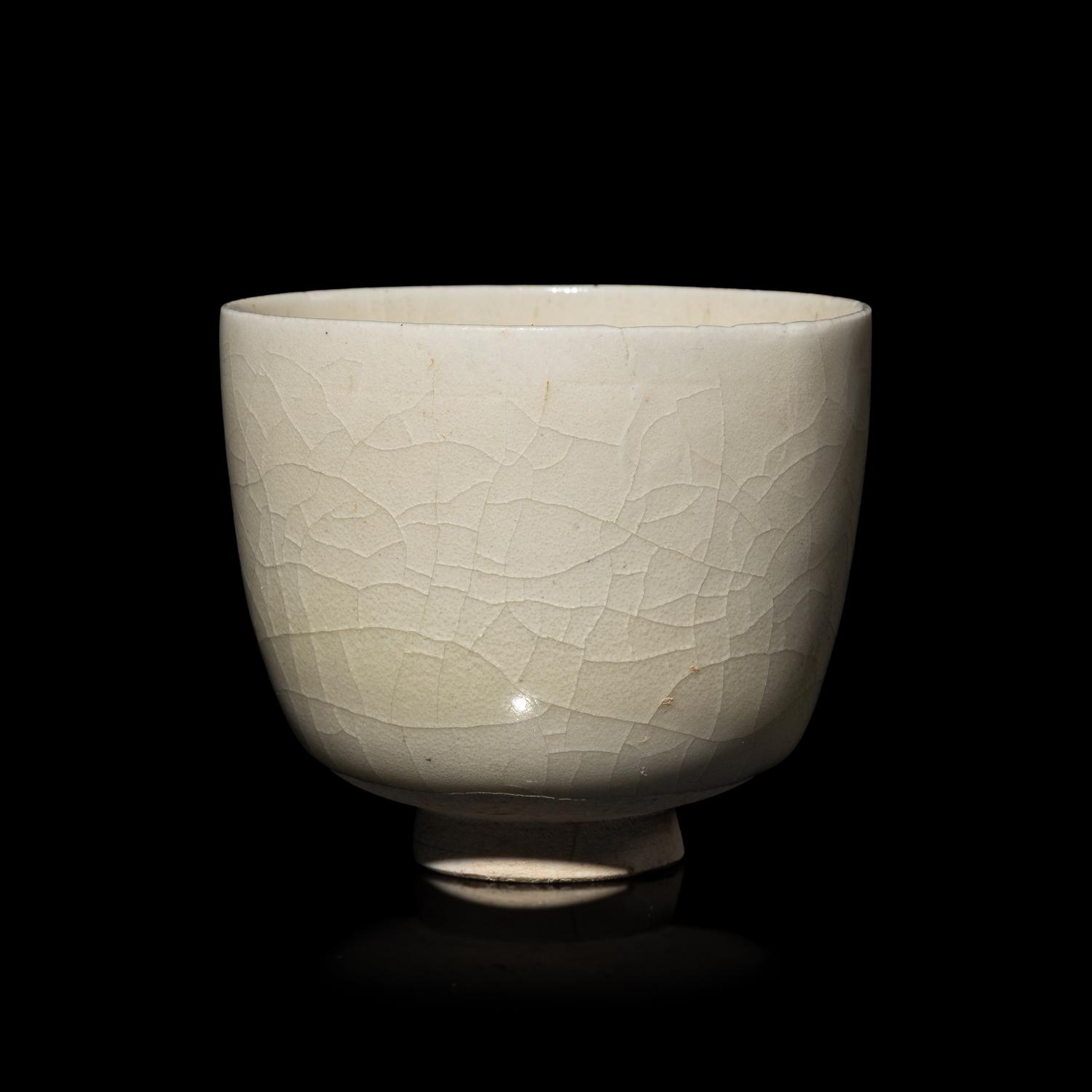 A Chinese White Glazed Cup — 白釉杯