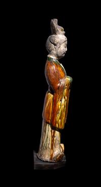 A Chinese Sancai Pottery Figure of a Standing Official