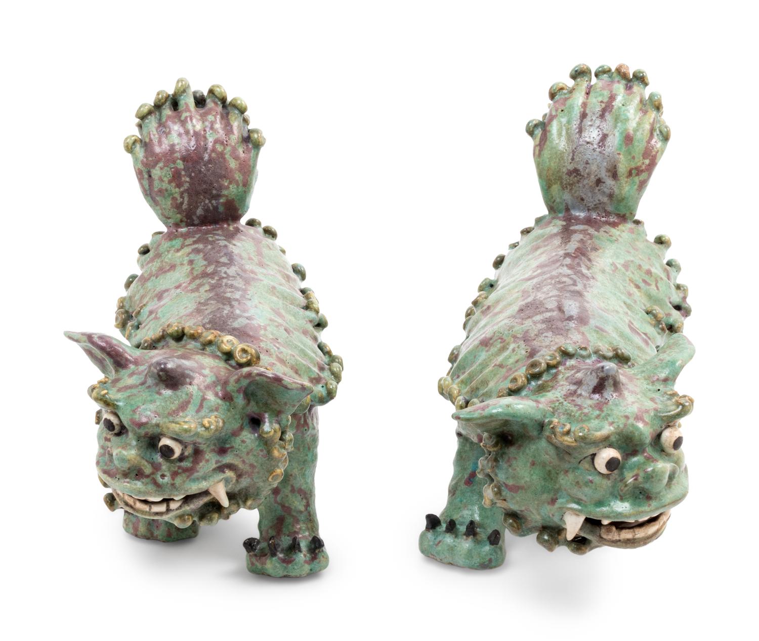 A Pair of Shiwan Red and Green Glazed Stoneware Figures of Fu Lions