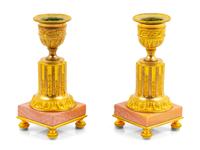 A Pair of Gilt Metal Candlesticks
