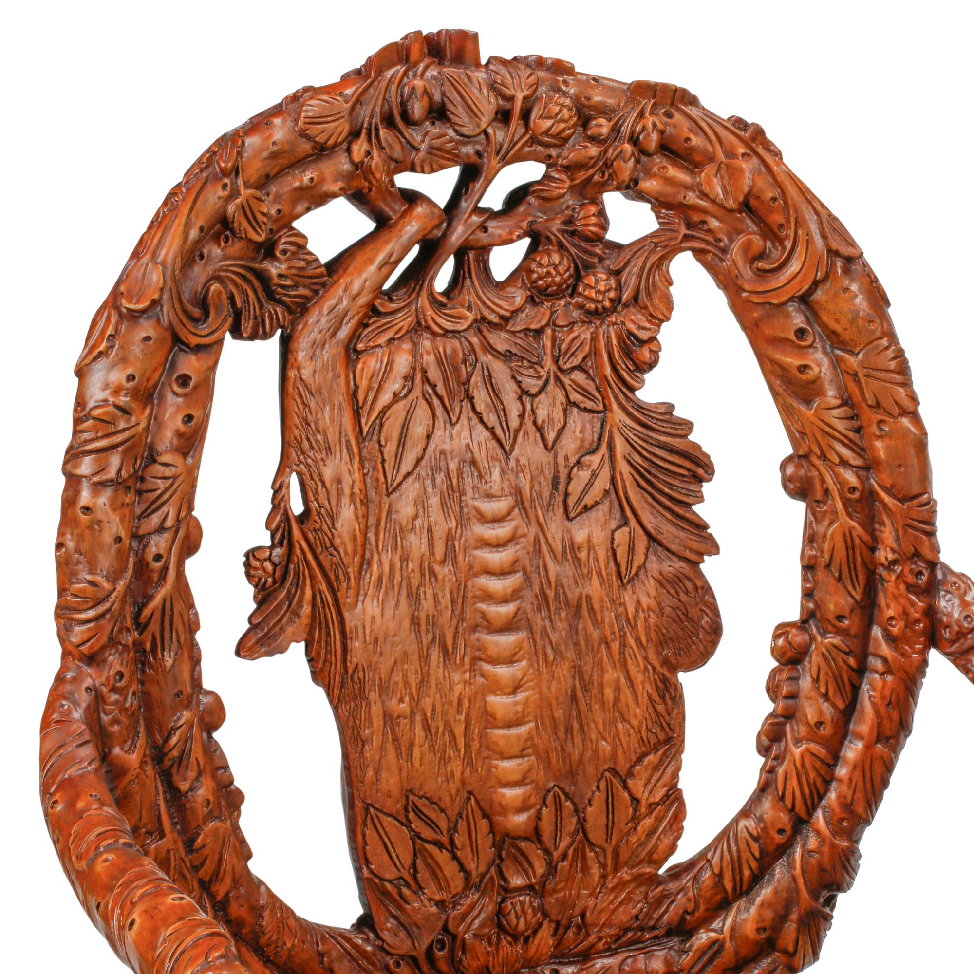 A Pair of Italian Carved Monkey Motif Fantasy Armchairs