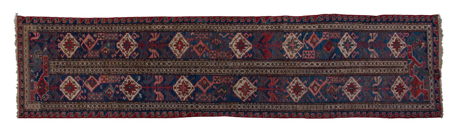A Soumak Flatweave Wool Runner, 11 feet 3 inches x 2 feet 8 inches.