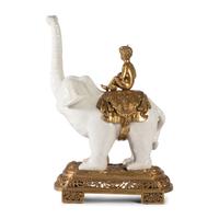 A Brass and Earthenware Elephant Figure