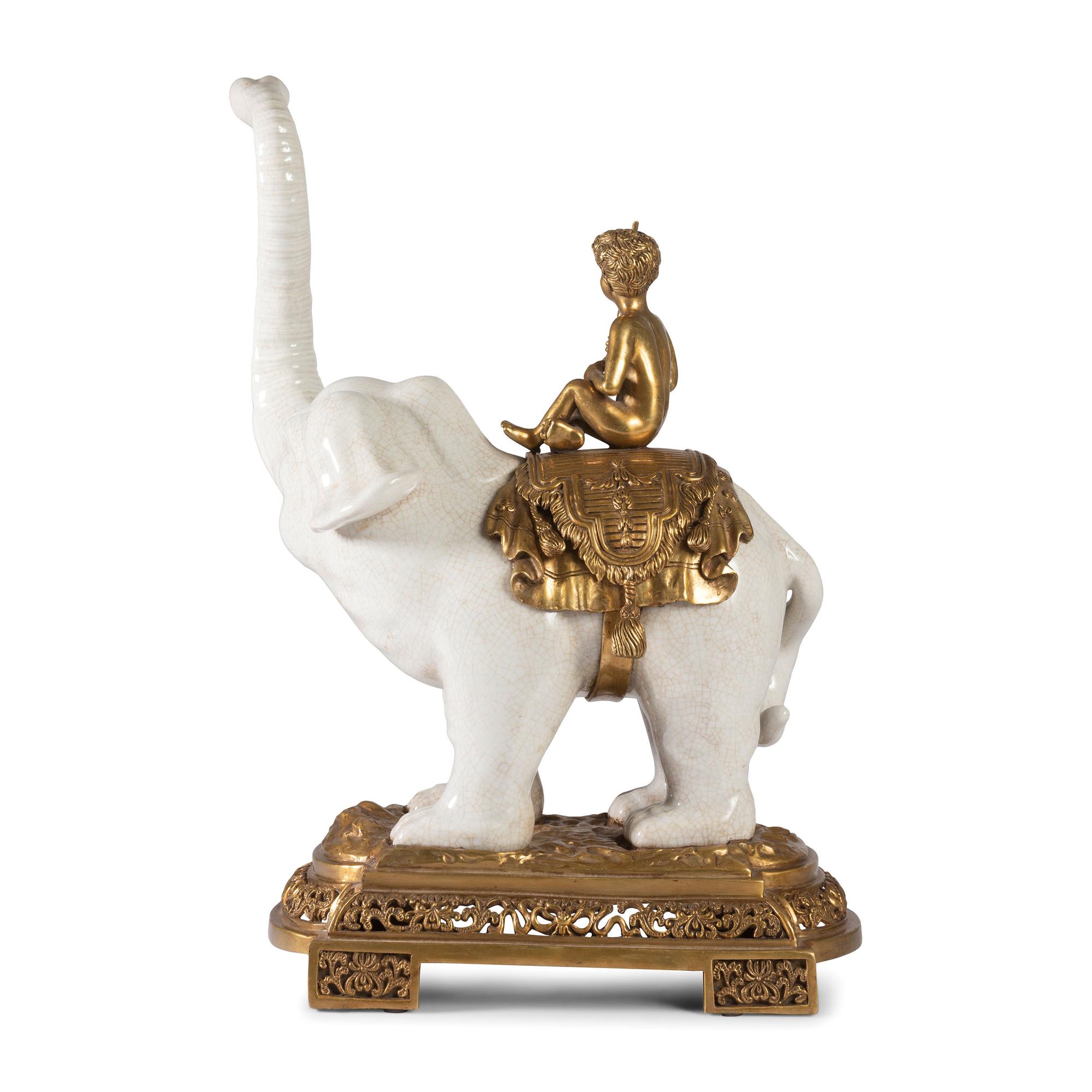 A Brass and Earthenware Elephant Figure