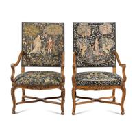 A Pair of Régence Style Walnut Armchairs