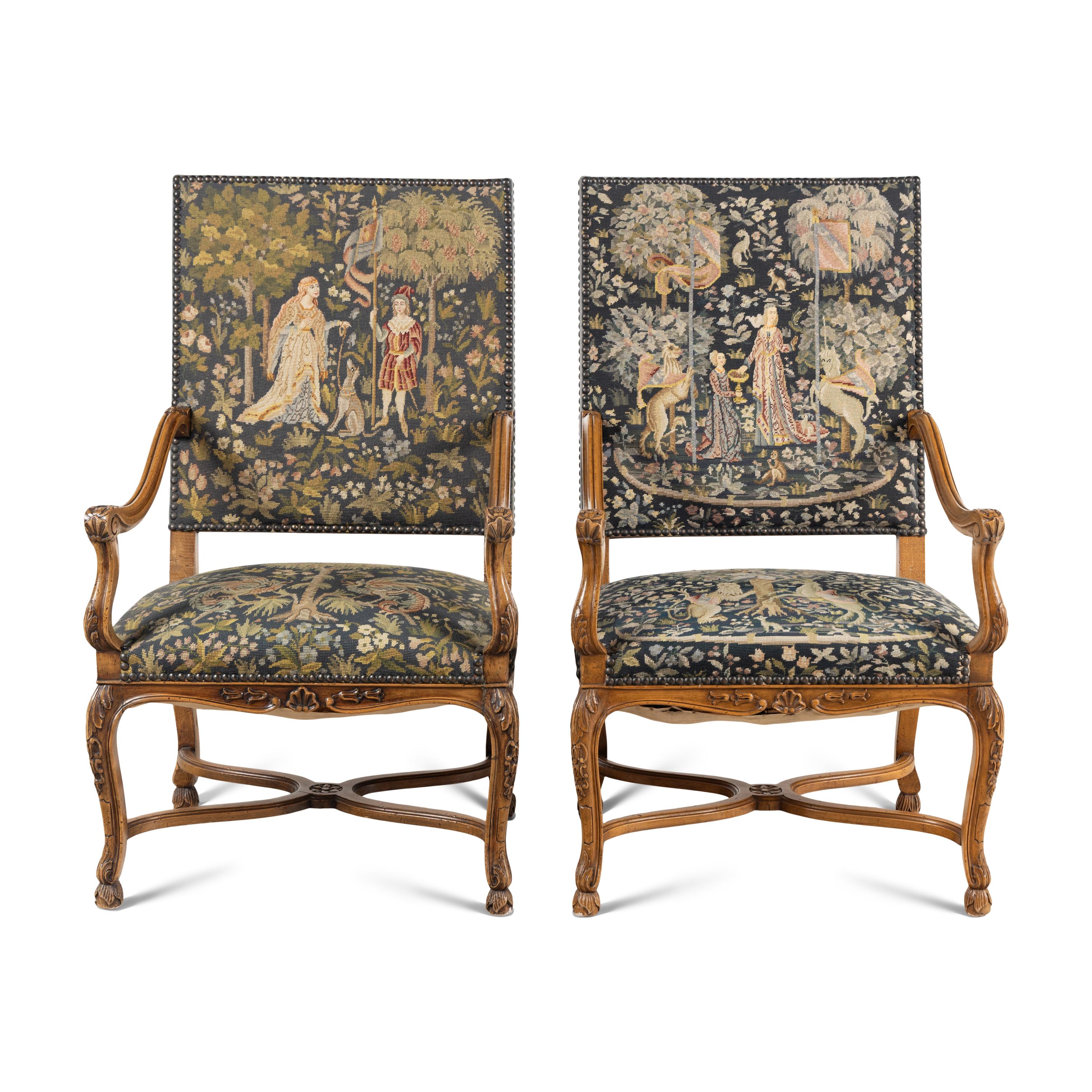 A Pair of Régence Style Walnut Armchairs