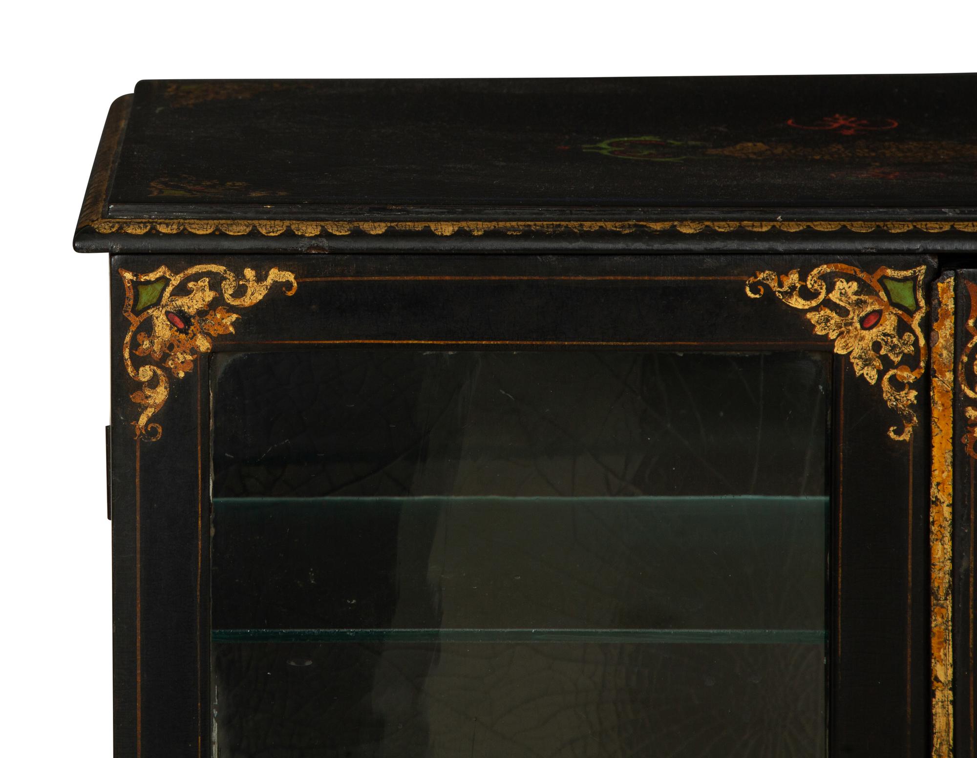 A Victorian Black and Gilt Lacquer Etagère on Stand