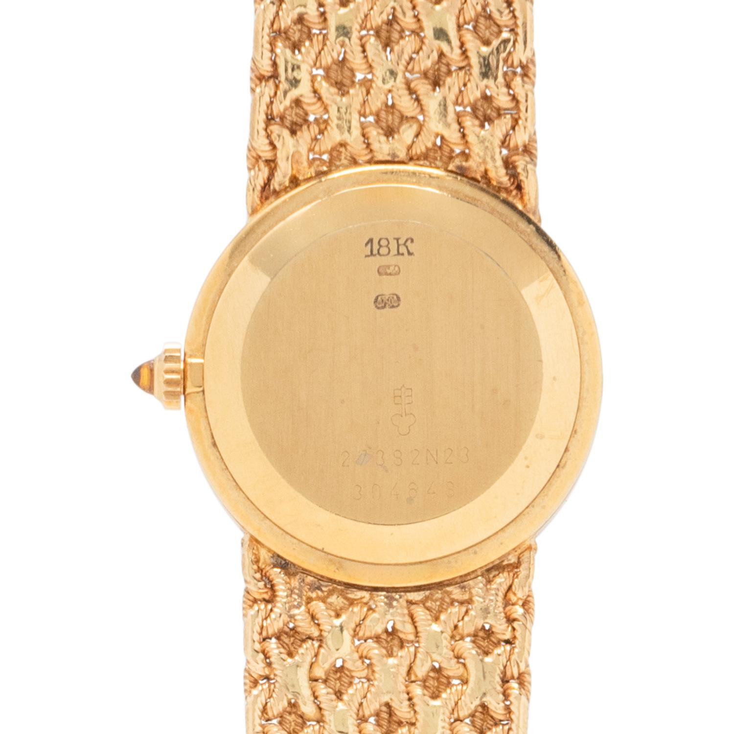 CORUM, YELLOW GOLD WATCH