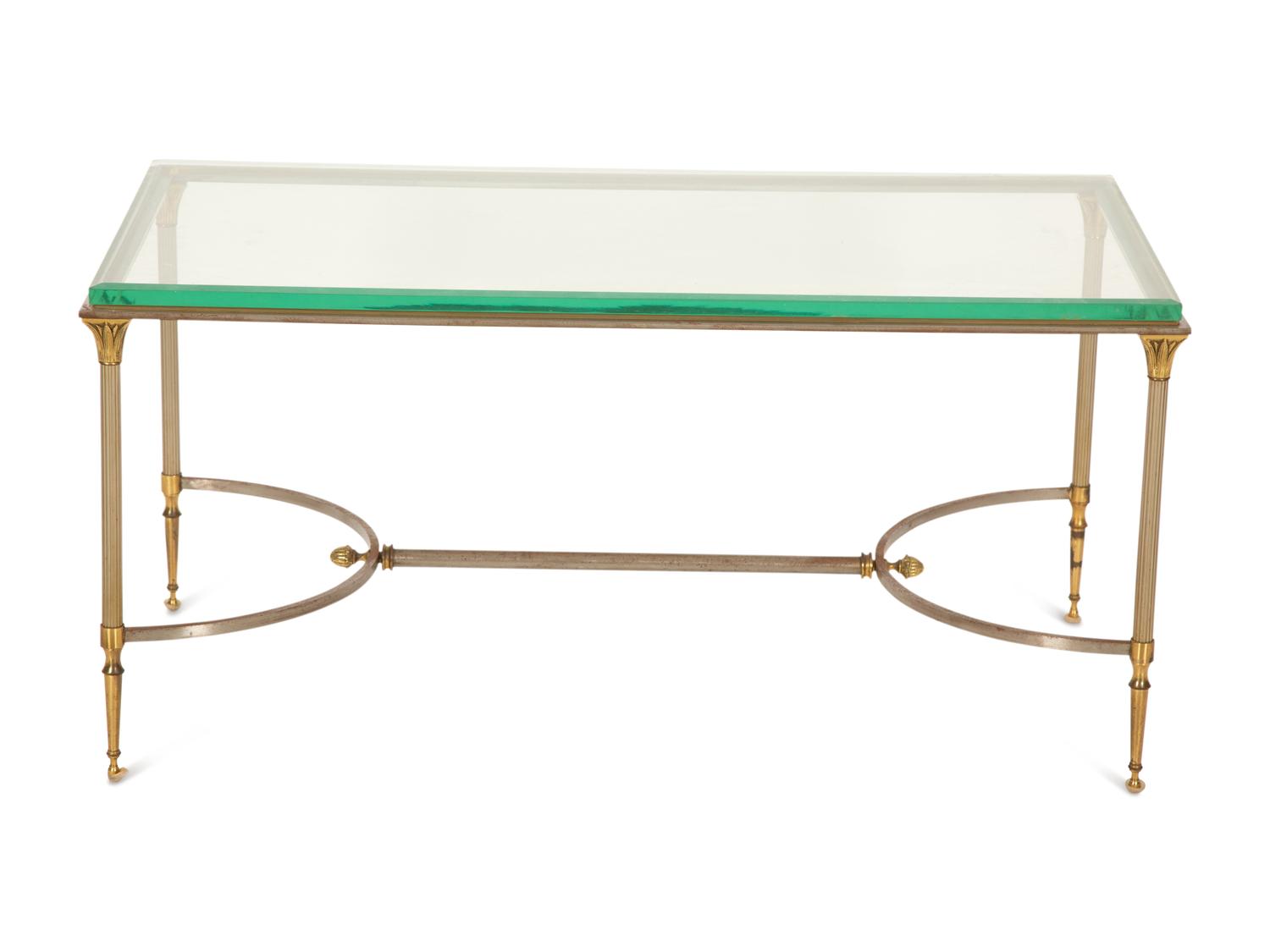 A Neoclassical Style Steel and Brass Glass Top Coffee Table in the Manner of Maison Jansen