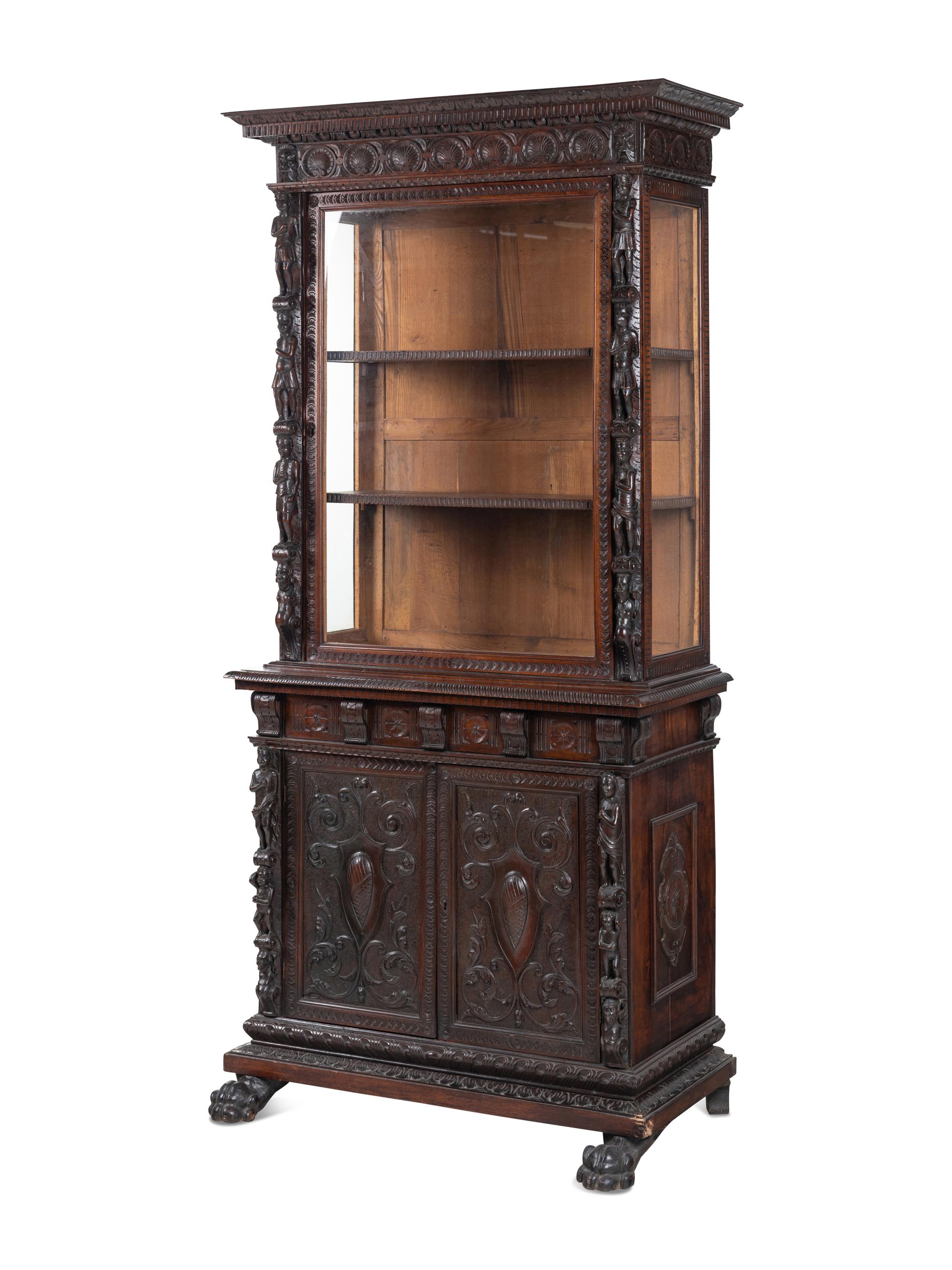 An Austrian Carved Walnut Cabinet