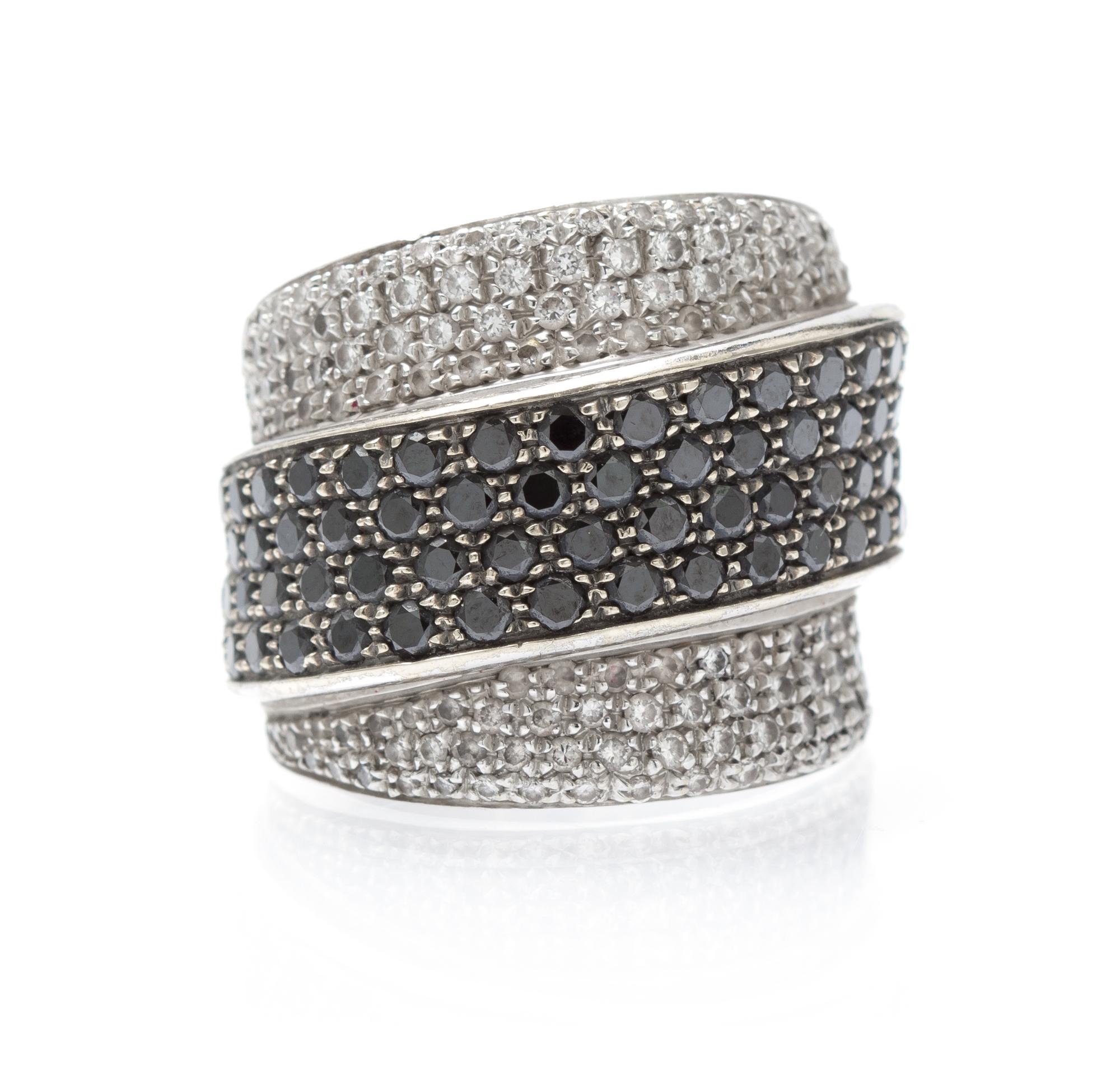 A White Gold, Treated Black Diamond and Diamond Ring, 11.50 dwts.