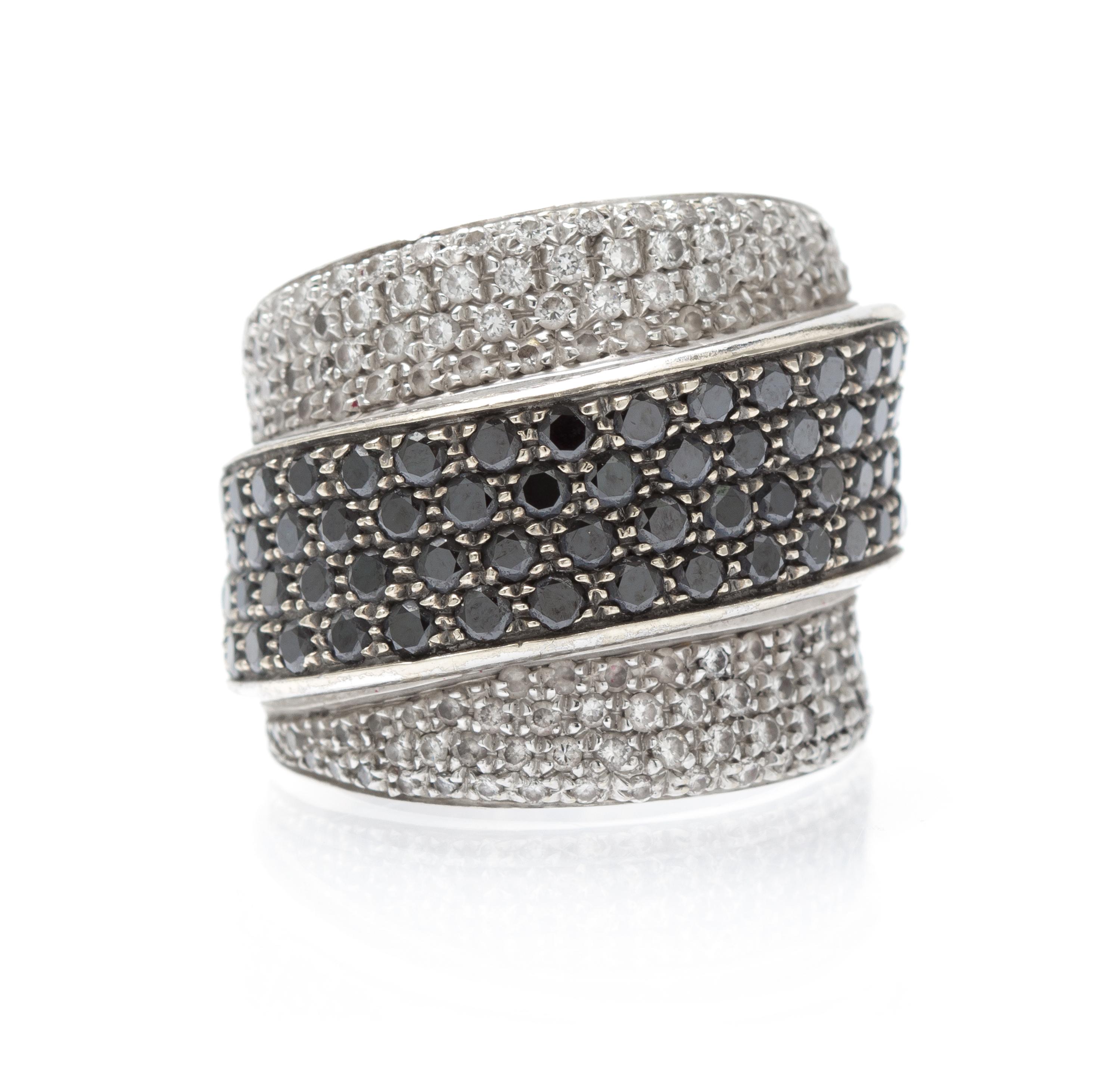 A White Gold, Treated Black Diamond and Diamond Ring, 11.50 dwts.