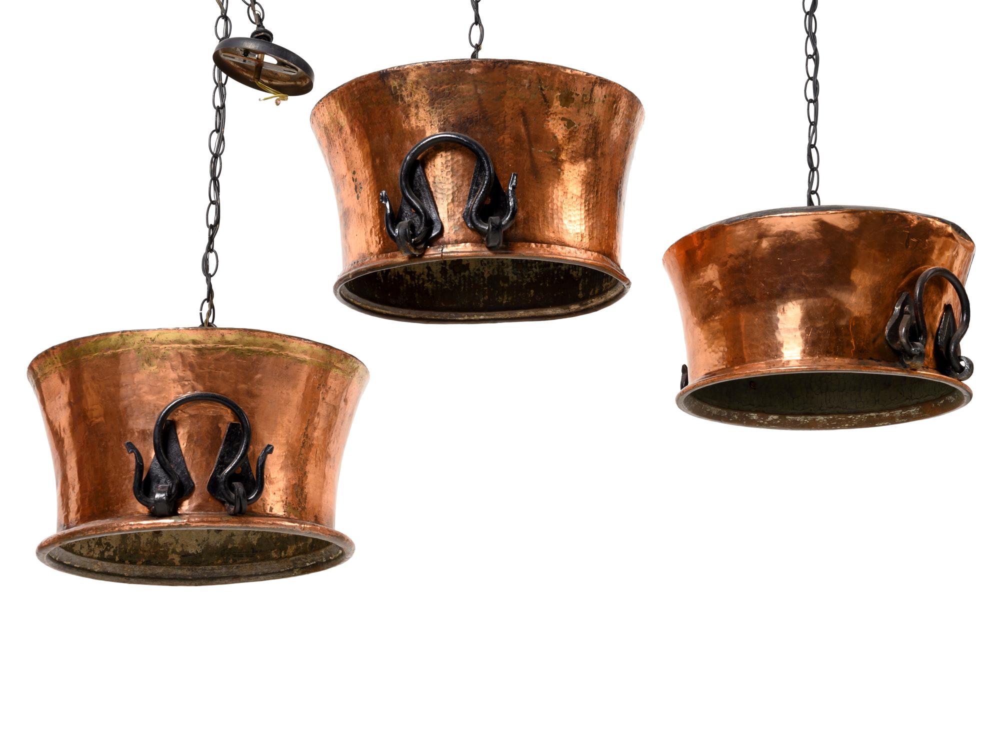 Three Copper and Metal Light Fixtures
