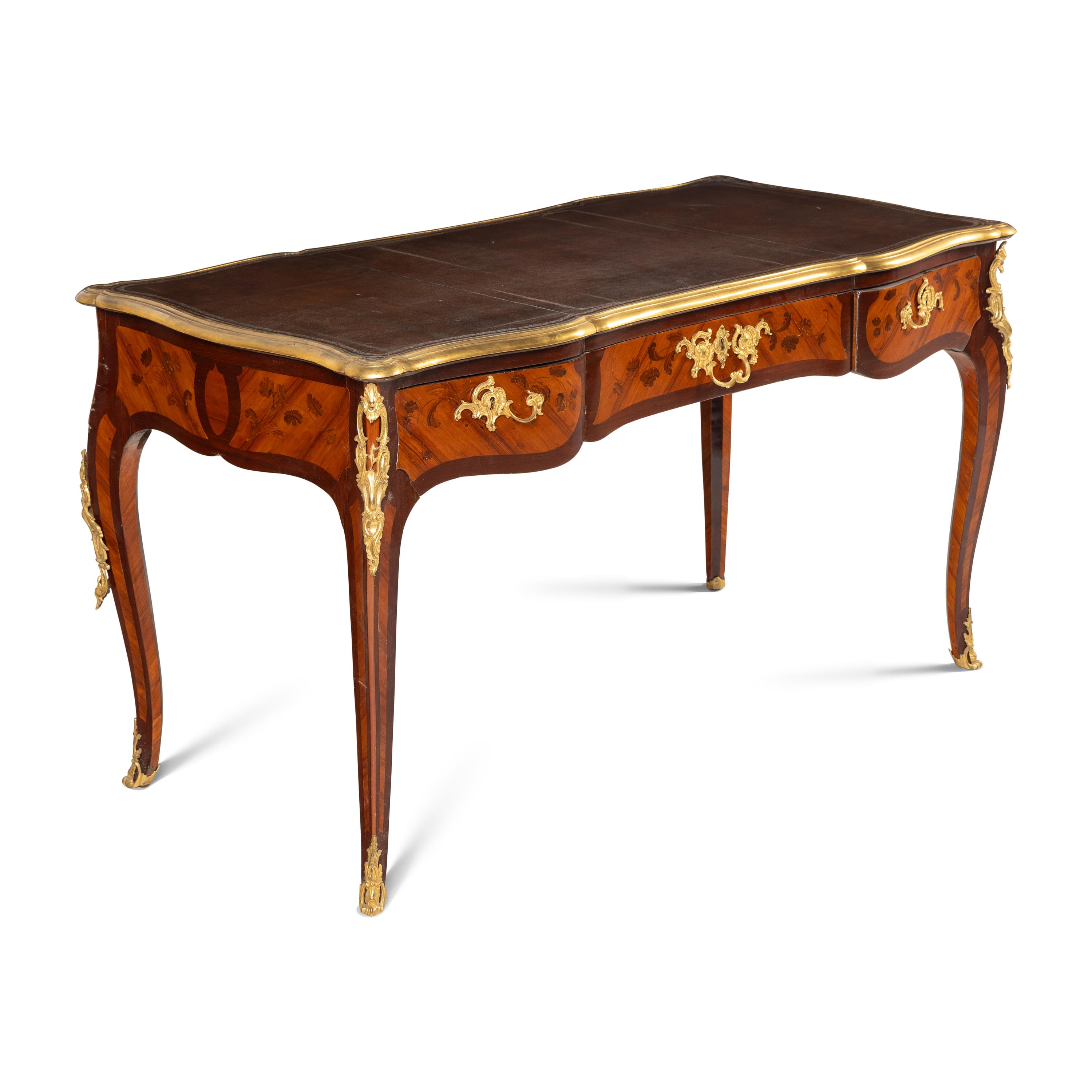 A Louis XV Gilt Bronze Mounted Tulipwood, Amaranth and Bois De Bout Marquetry Bureau Plat