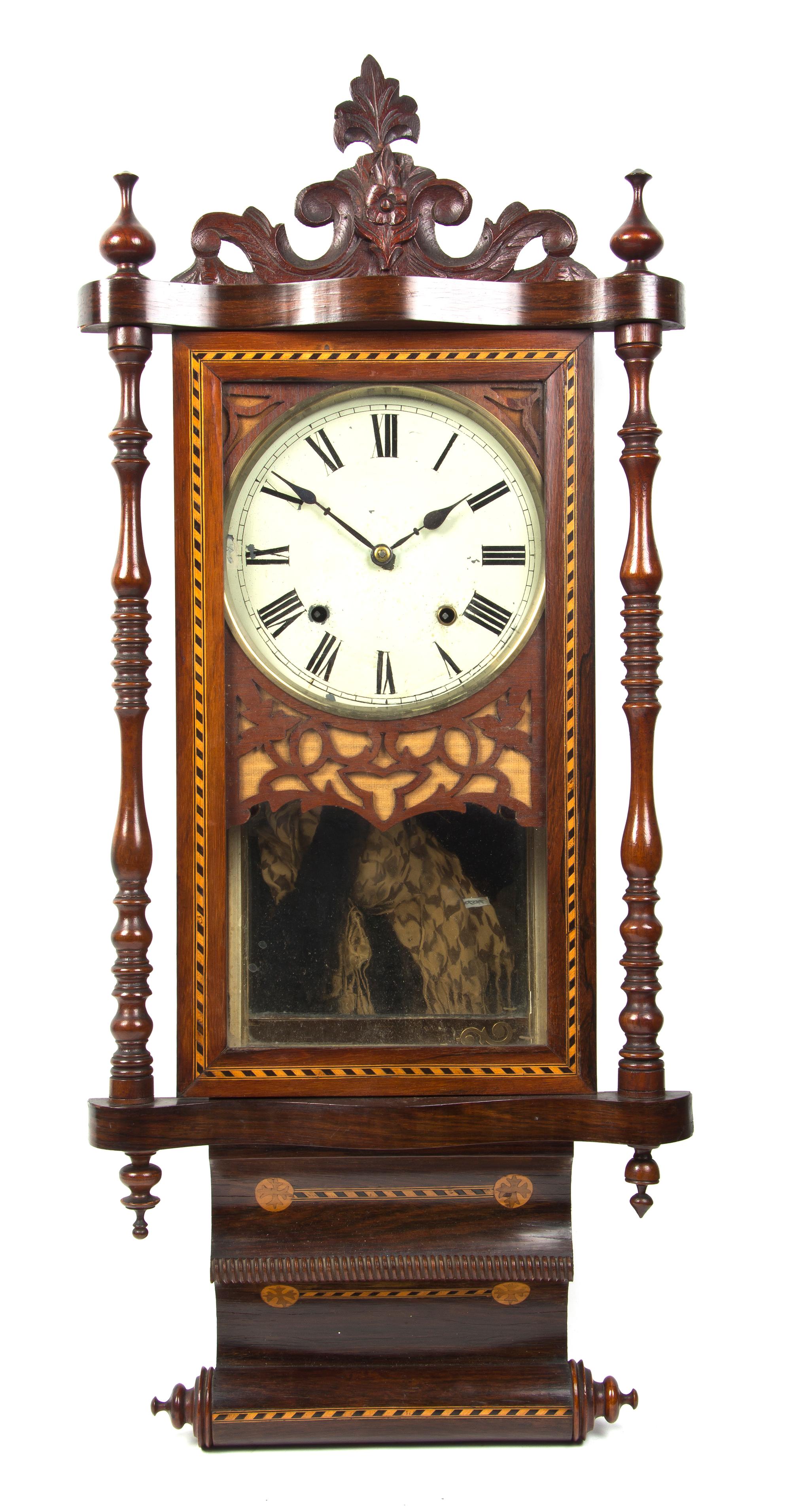 An Anglo-American Various Woods Scroll Clock, Height overall 37 inches.