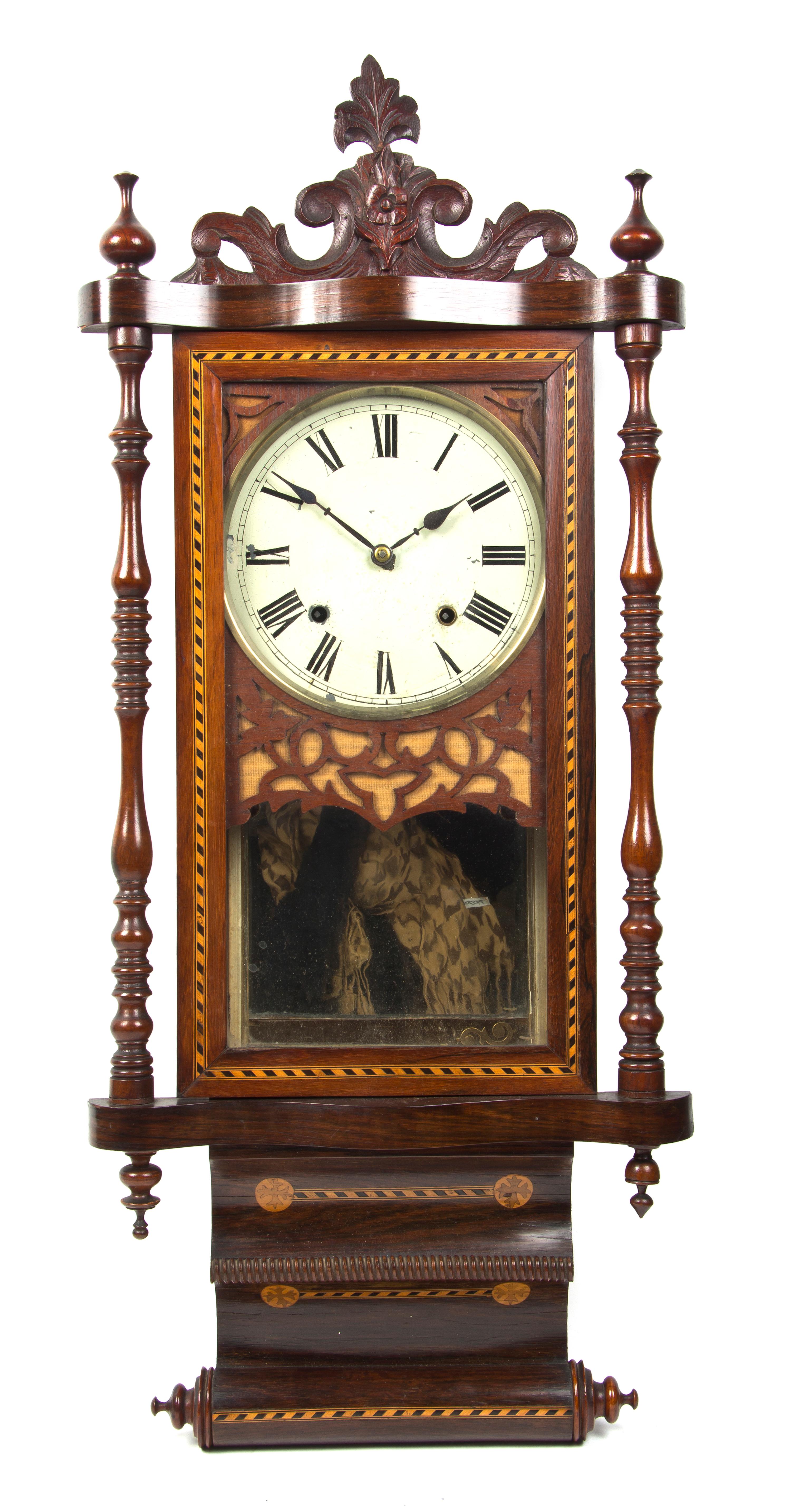 An Anglo-American Various Woods Scroll Clock, Height overall 37 inches.