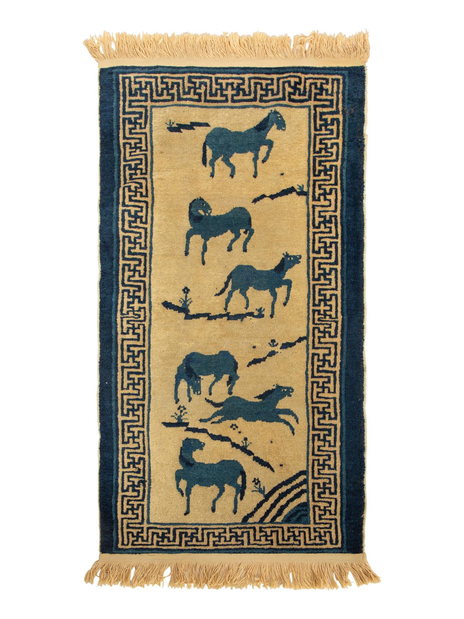 A Group of Three Chinese Rugs
