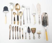 A Group of Silver-Plate Flatware Servers Length of longest 13 1/2 inches.
