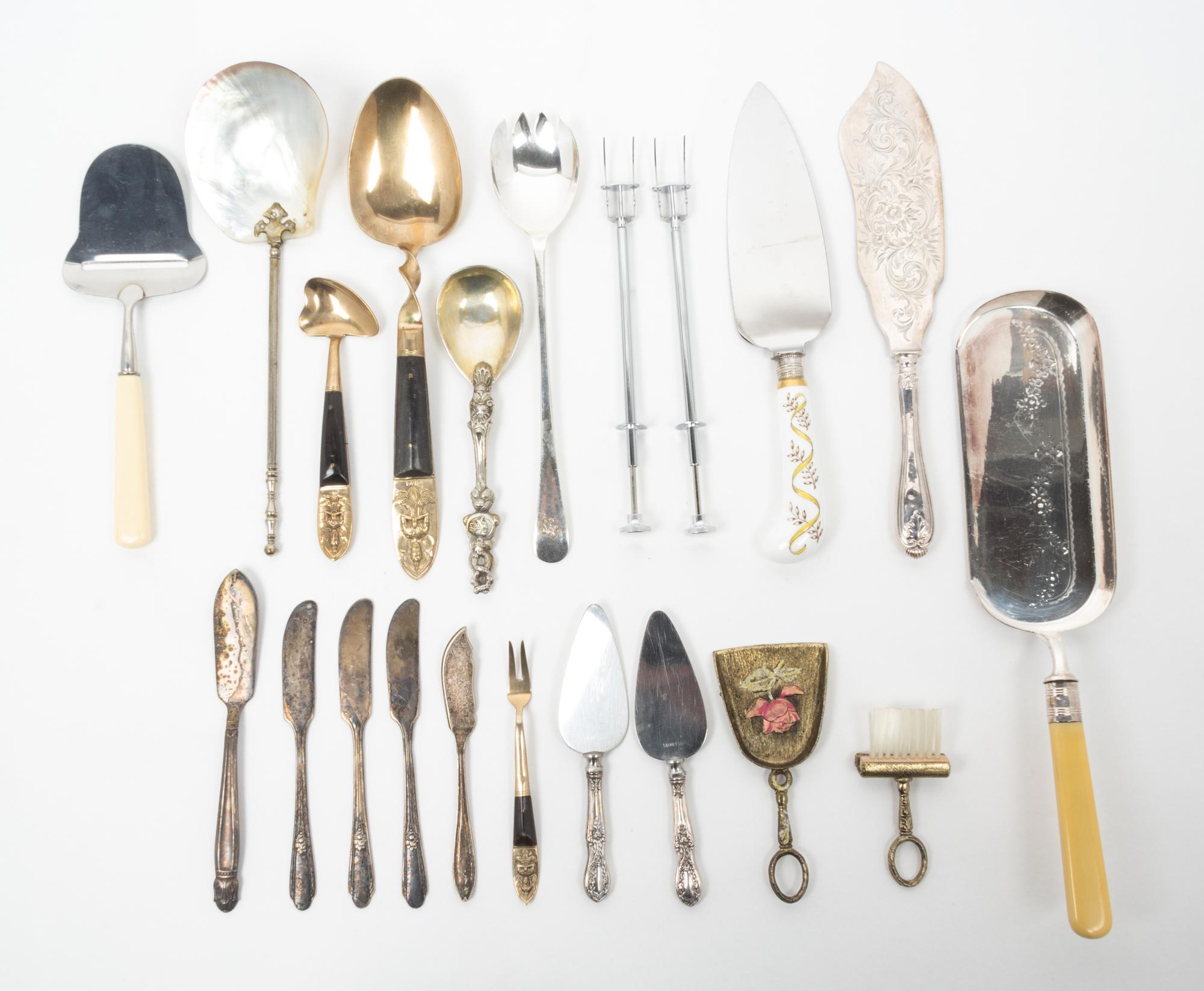 A Group of Silver-Plate Flatware Servers Length of longest 13 1/2 inches.