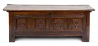 An Italian Oak Cassone Height 26 x width 71 x depth 22 3/4 inches.