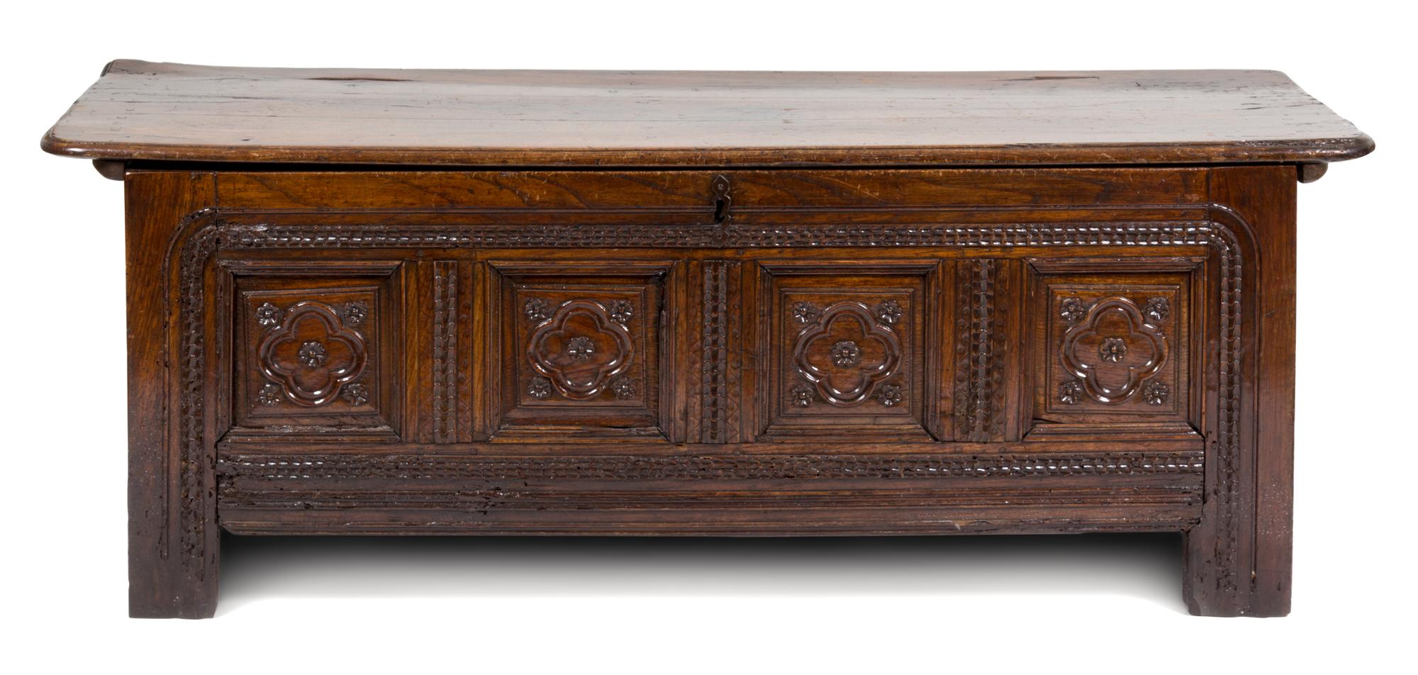 An Italian Oak Cassone Height 26 x width 71 x depth 22 3/4 inches.