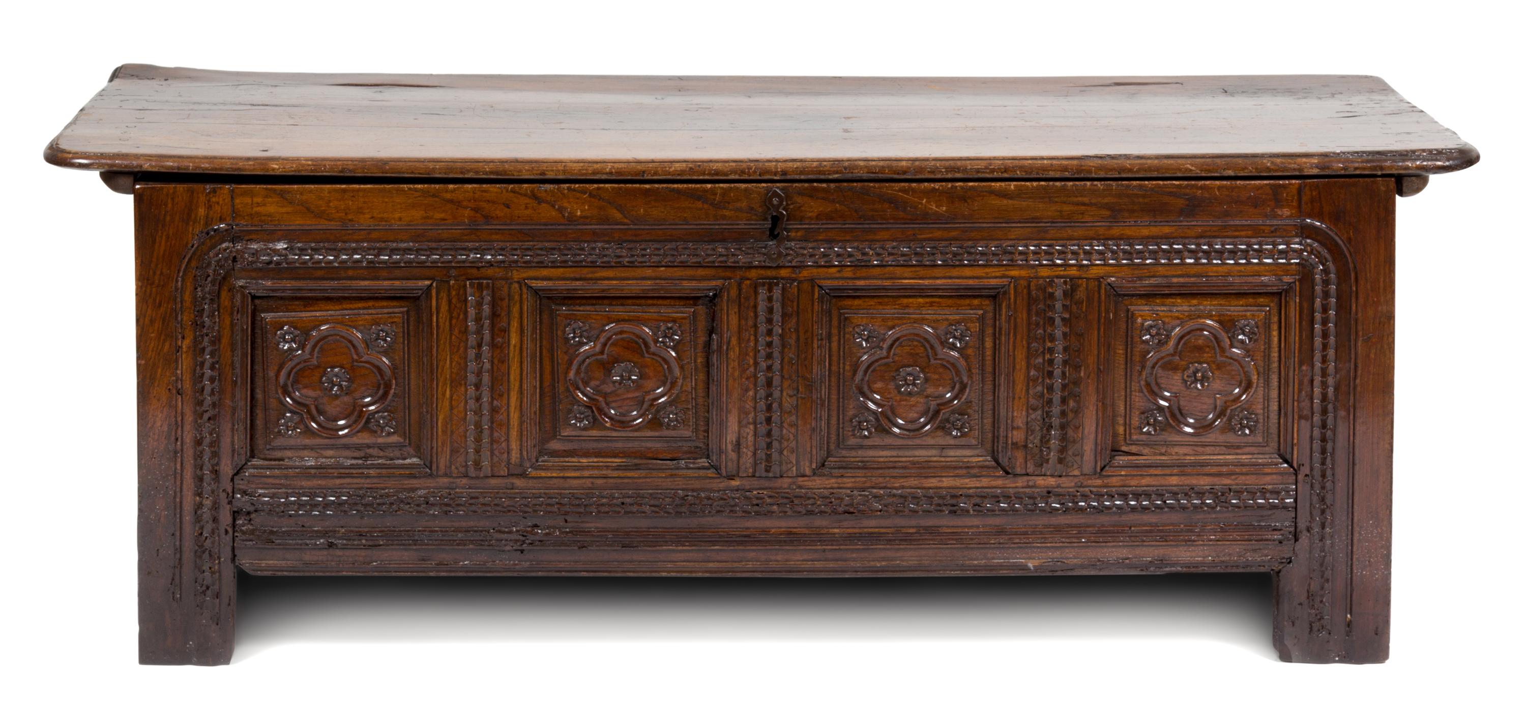 An Italian Oak Cassone Height 26 x width 71 x depth 22 3/4 inches.