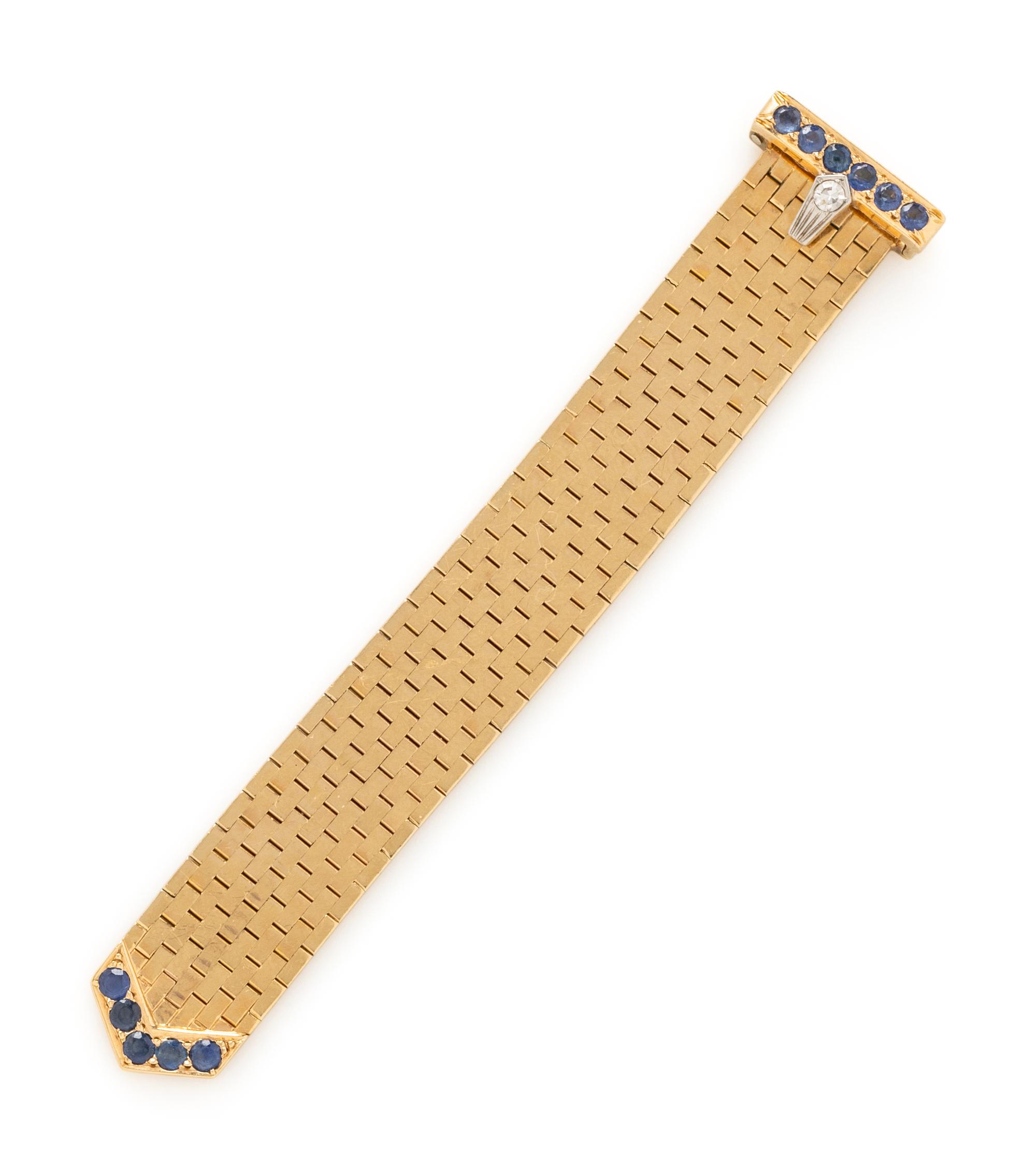 BICOLOR GOLD, SAPPHIRE, AND DIAMOND BUCKLE RING
