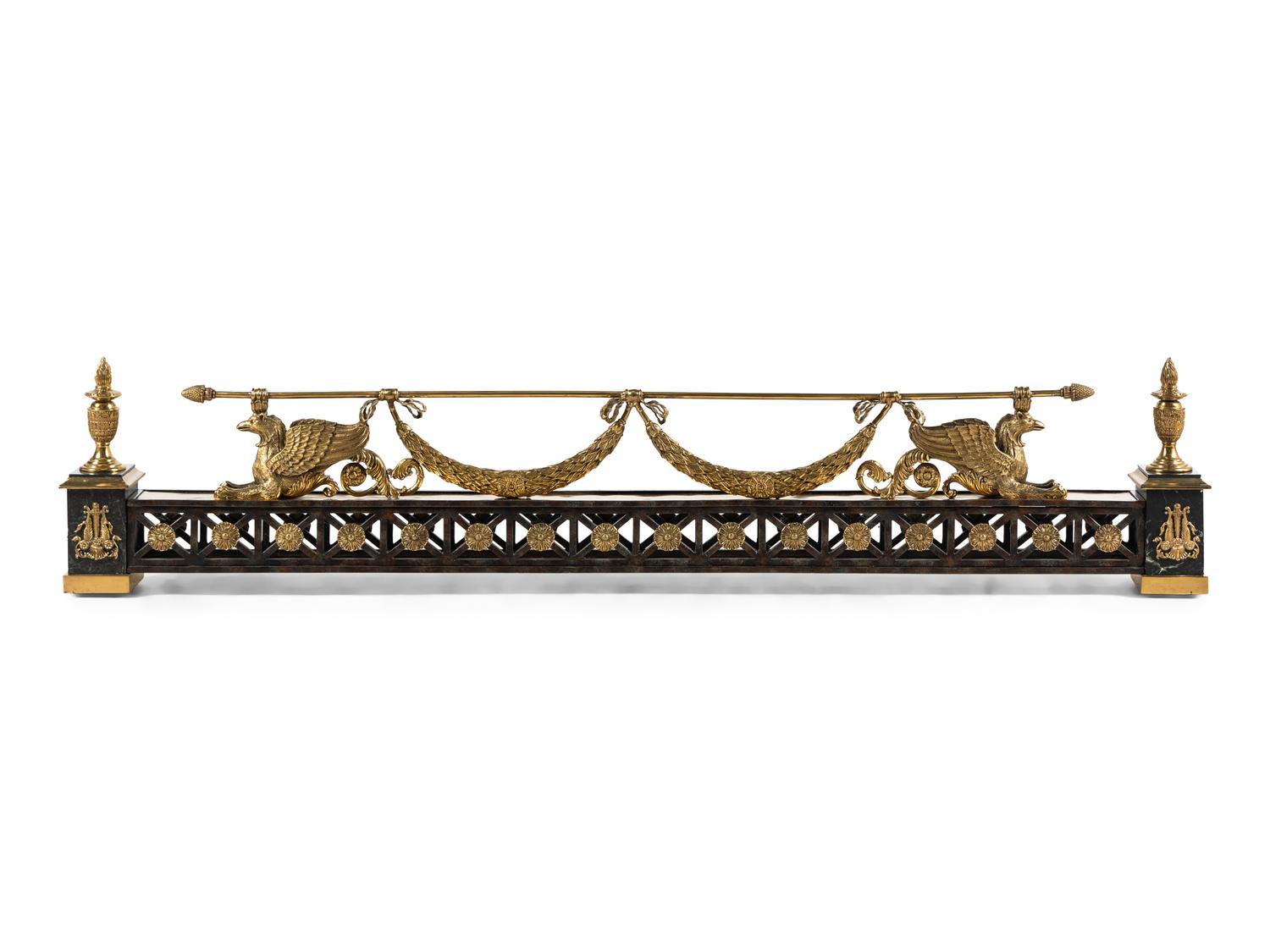 An Empire Style Gilt and Patinated Bronze Fireplace Fender