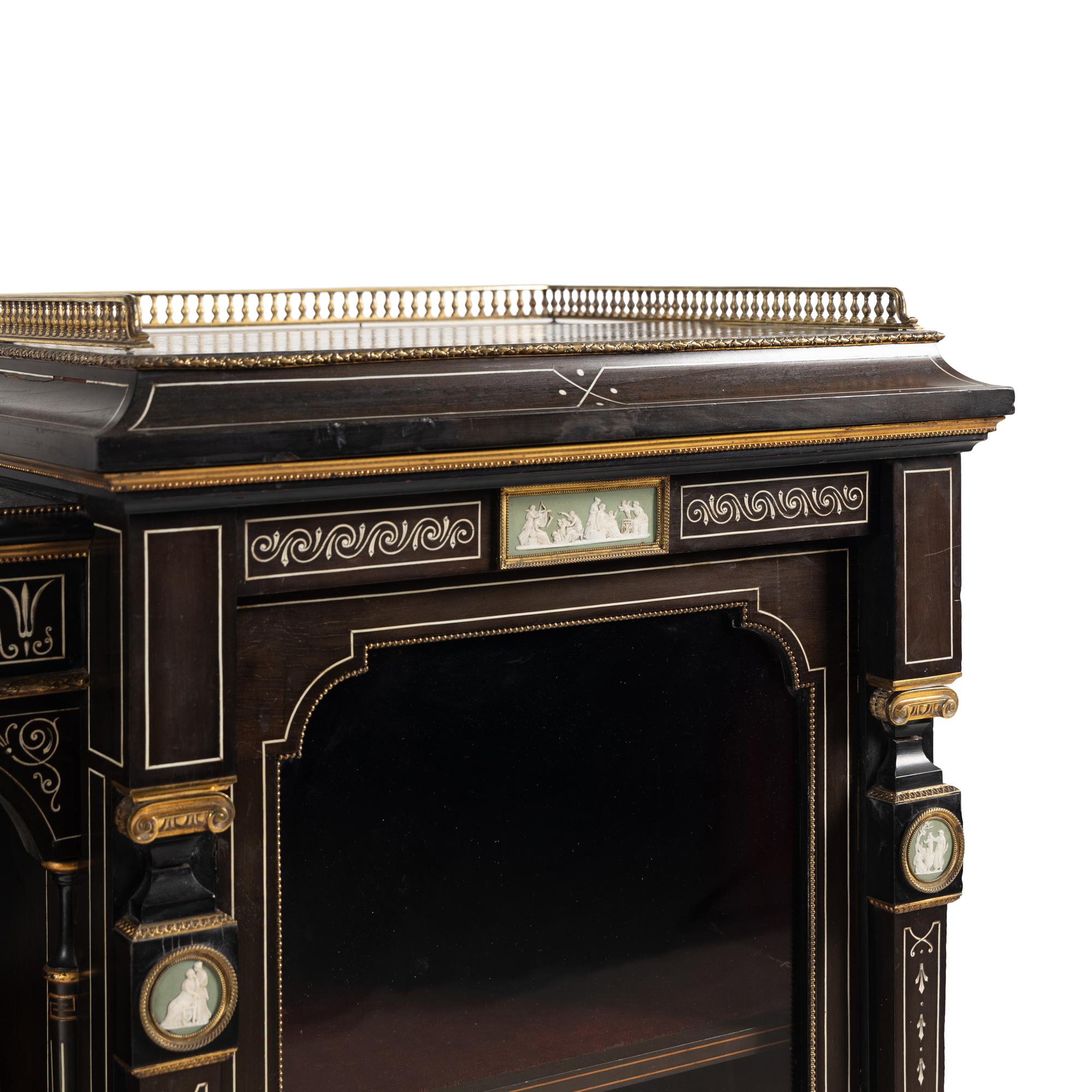 An English Aesthetic Movement Brass-Mounted and Wedgewood Jasperware Inset, Mahogany and Ebony Drawing Room Cabinet