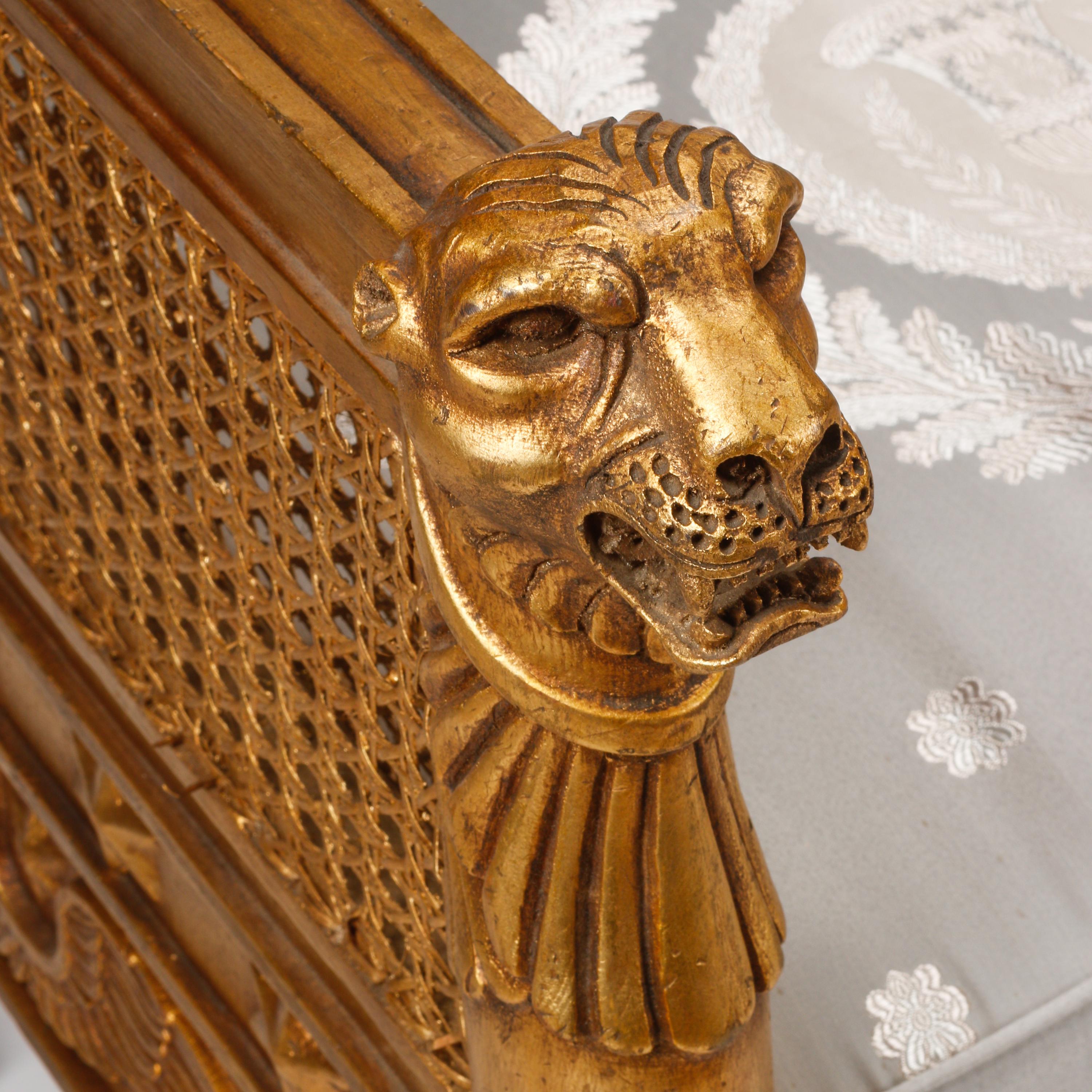 A Pair of Italian Neoclassical Style Giltwood and Cane Armchairs