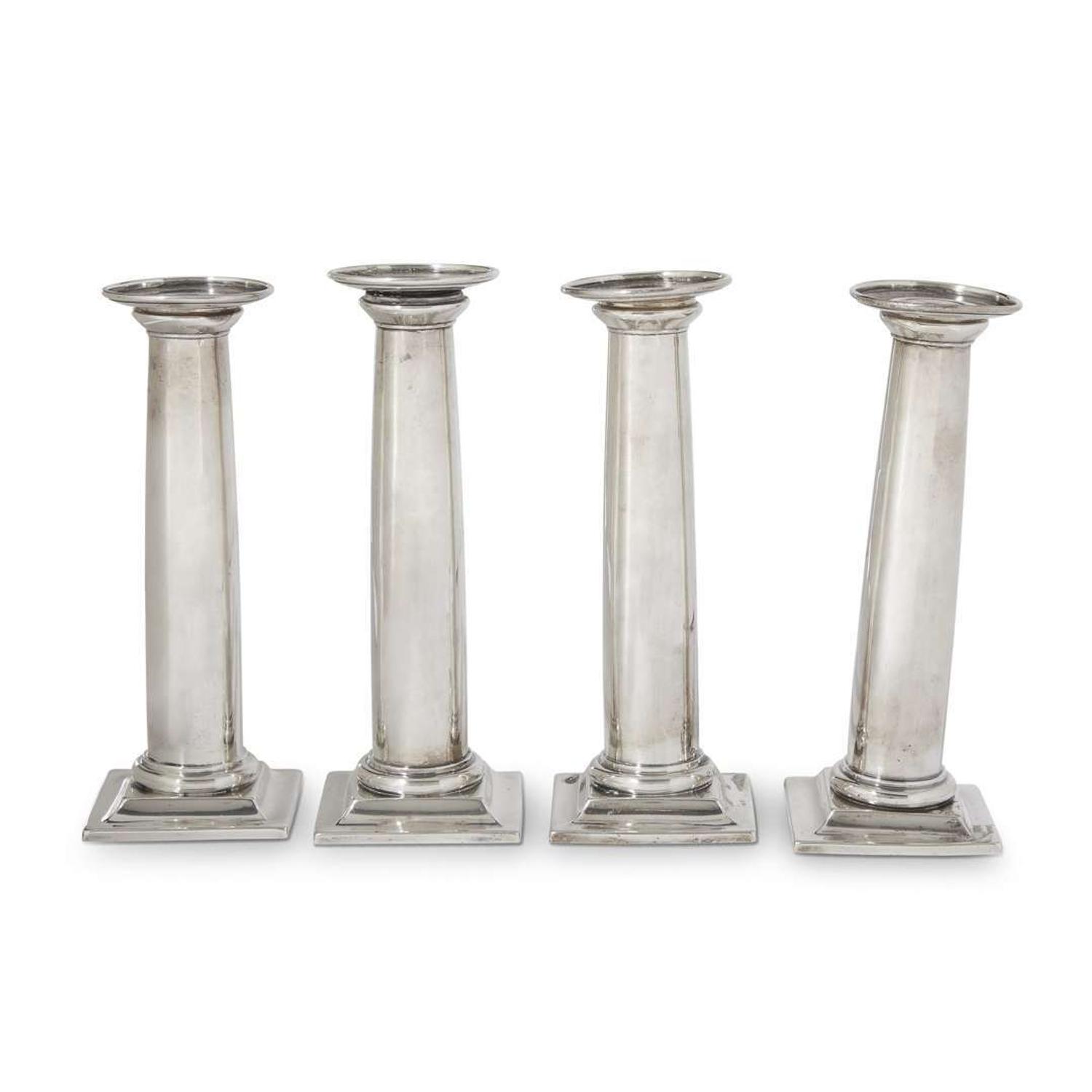 Four American sterling silver candlesticks in the form of Doric columns international silver co., meriden, connecticut, 20th century